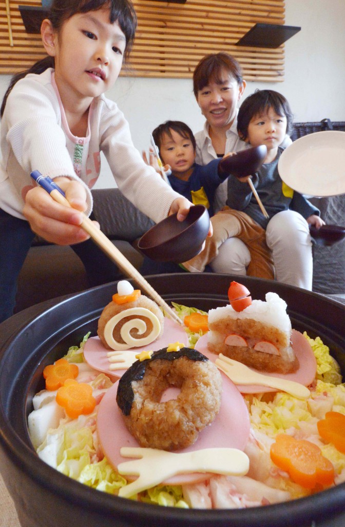 Kazuyo Yamazaki and her children enjoying hot pot with pieces of shortcake, Swiss roll and doughnut (in Shinjuku-ku, Tokyo) 