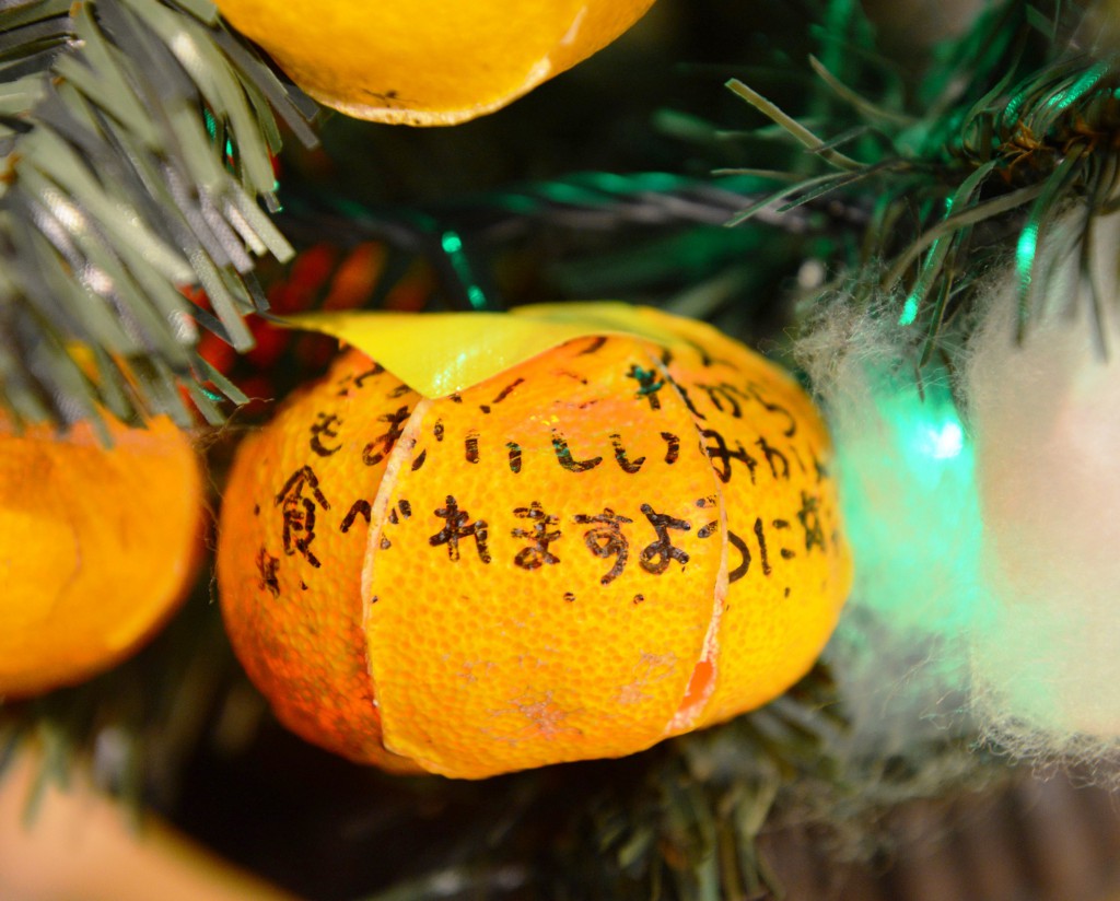Students wrote messages on ornaments
