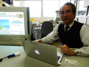 University of Miyazaki Prof. Masahito Suiko explains the team’s achievements using a projector in Miyazaki.
